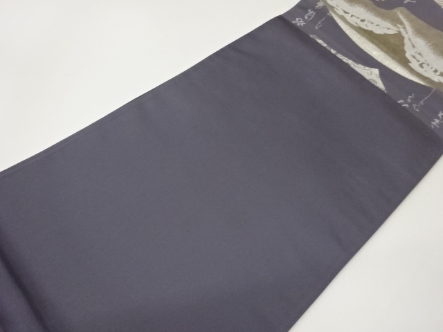  破れ色紙に唐草・山模様織出し袋帯